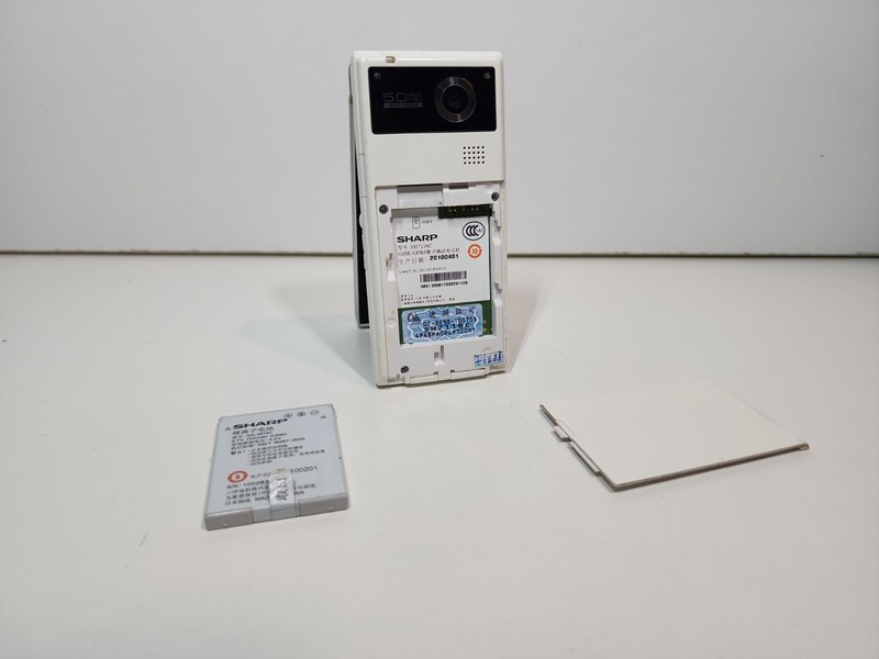 SHARP AQUOS WHITE SH-7118C Android Flip Phone Used Needs New Battery gallery