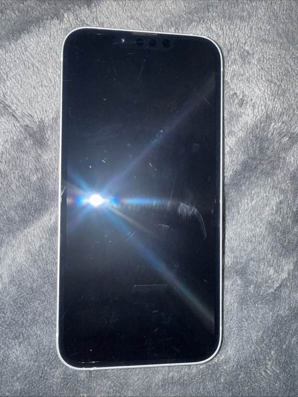 Apple iPhone 16e 128GB normal wear and tear locked to “ Verizon/Spetrum”