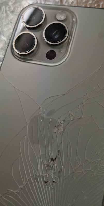 T-Mobile iPhone 16 Pro Max Natural Titanium 256GB AppleCare+ 92% Battery