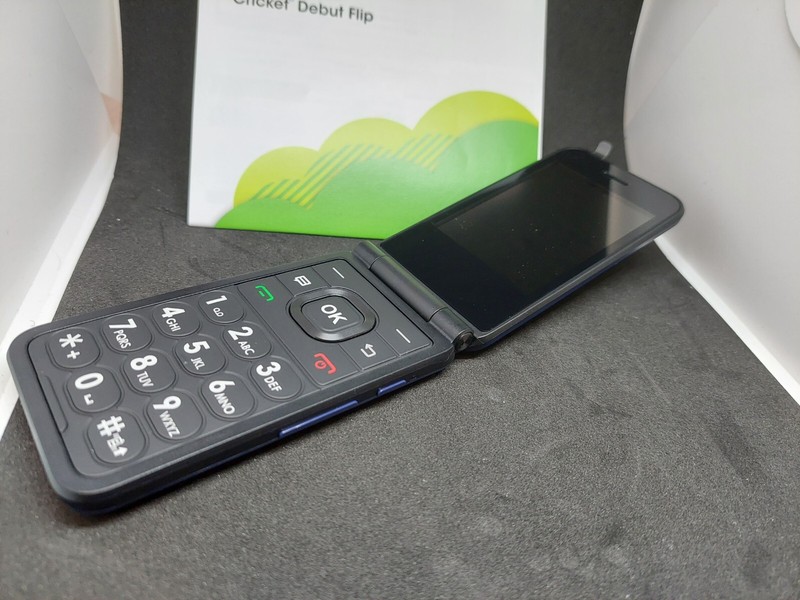 AS-IS Cricket U102AC Prepaid Debut Flip(4GB)-Black/Navy Blue (WILL NOT WORK US) gallery