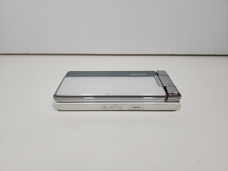 SHARP AQUOS WHITE SH-7118C Android Flip Phone Used Needs New Battery gallery