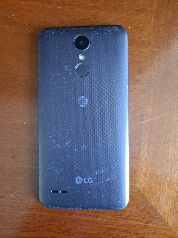 LG Phoenix 4 AT&T Prepaid Smartphone 16gb For Parts Does Not Work