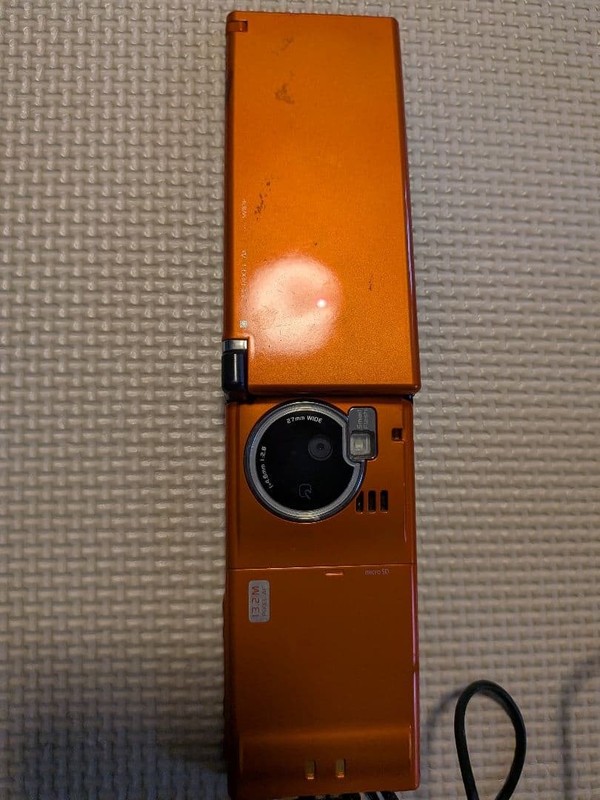 NTT Docomo P-04B Orange Folding Mobile Japanese Flip phone Garake Keitai